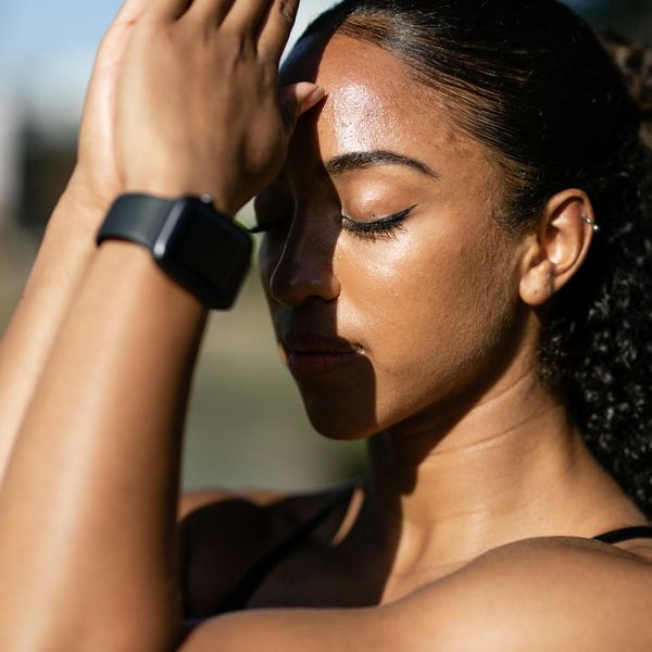 Person in a calm, meditative state surrounded by nature.